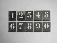 Vintage box of various stencils