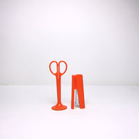 Orange stapler