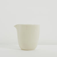 Thick cream clay jug
