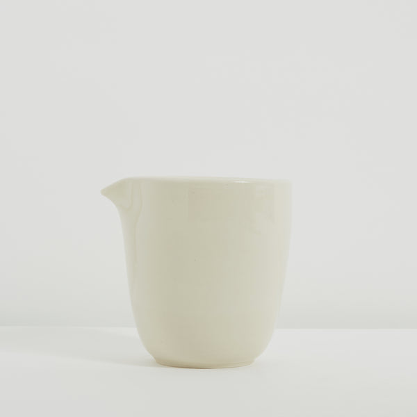 Thick cream clay jug