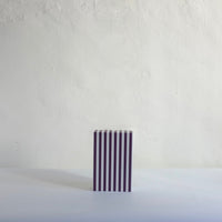 Black striped box with green base