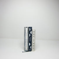 Graphic blue cloth books