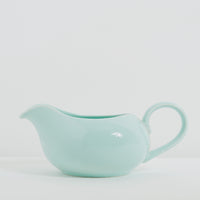 Blue ceramic gravy boat jug