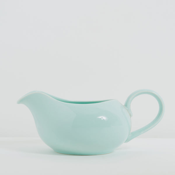 Blue ceramic gravy boat jug