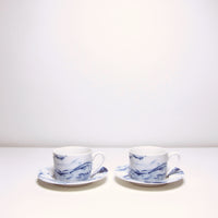Blue marble effect cup & saucer