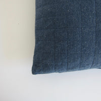 Blue quilted cushion