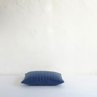 Blue quilted cushion