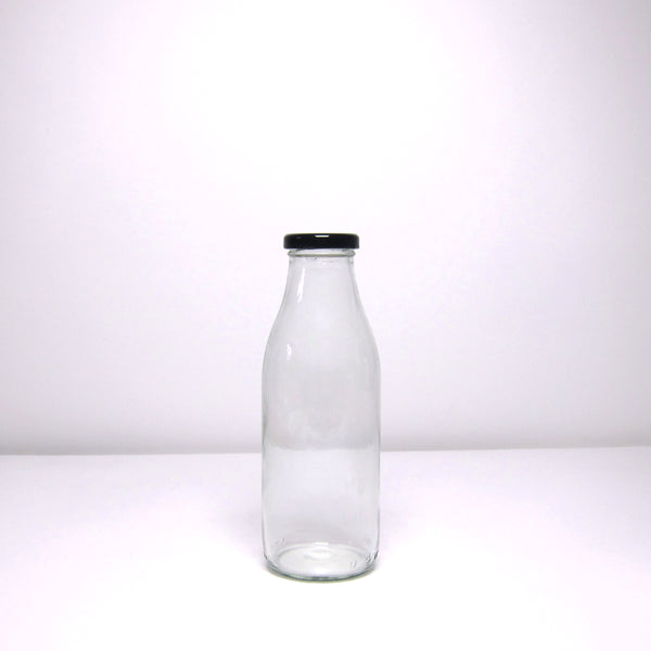 Milk bottle with black lid