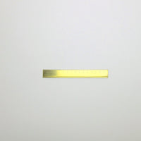 Wide brass ruler