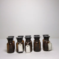 Brown glass apothecary bottles