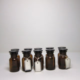Brown glass apothecary bottles