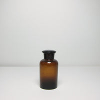 Brown glass apothecary bottle