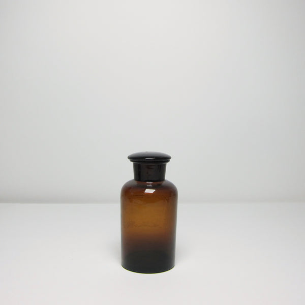 Brown glass apothecary bottle