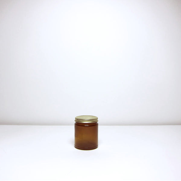 Brown glass jar with lid
