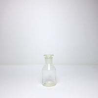 Clear glass apothecary bottle