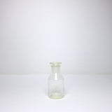 Clear glass apothecary bottle