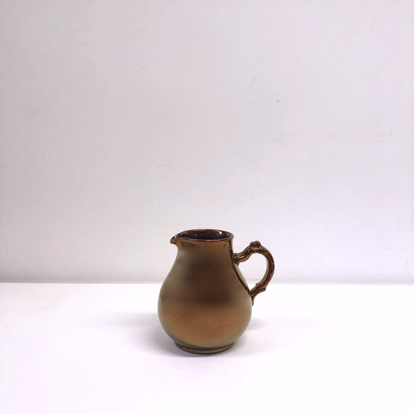 Copper glazed ceramic jug