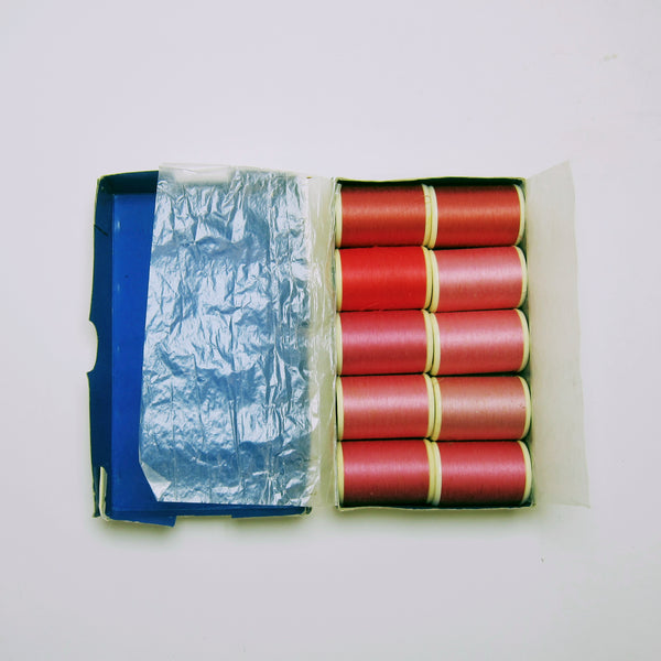 DMC box of pink thread