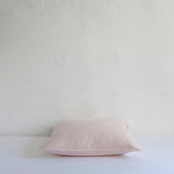 Pale pink cotton cushion