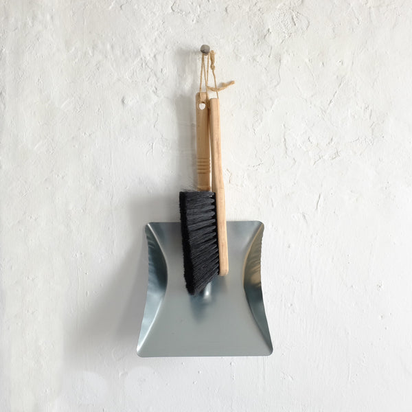 Dustpan + brush.