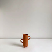 Double handled terracotta cup