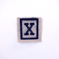 Embroidered X