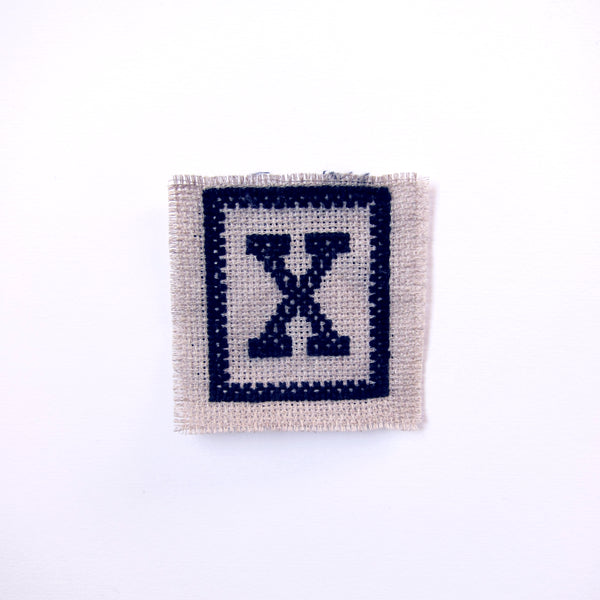 Embroidered X