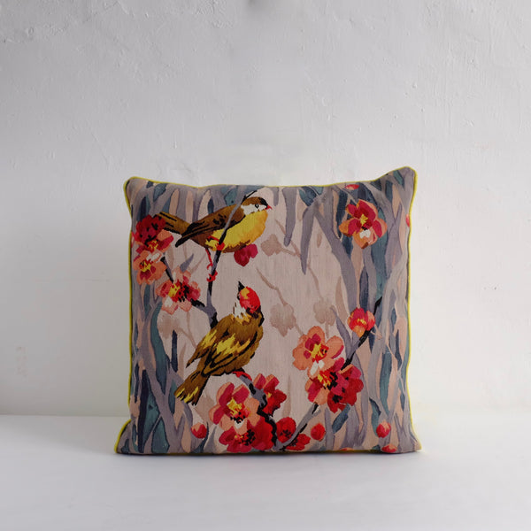Embroidered bird cushion