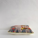 Embroidered bird cushion
