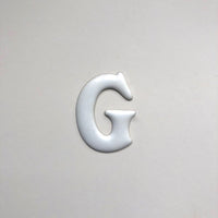 White emamel G