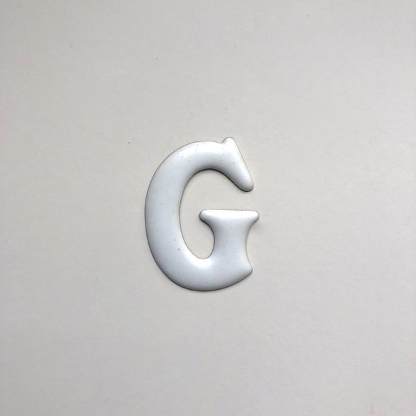 White emamel G