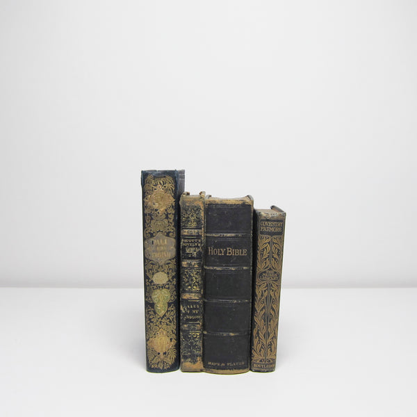 Four vintage black books