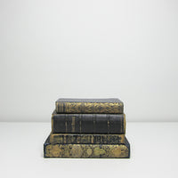 Four vintage black books