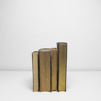 Four vintage black books