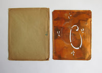 Vintage box of various stencils
