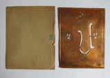 Vintage box of various stencils