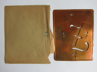Vintage box of various stencils