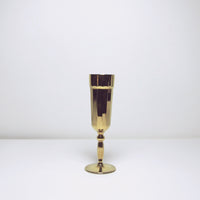 Gold glass champagne flute