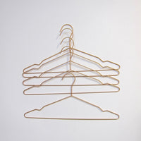 Gold coat hangers: set 4