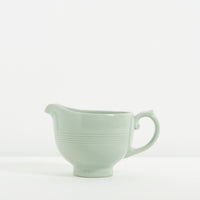 Green ceramic jug