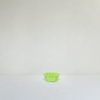Green scalloped edged paper bowl