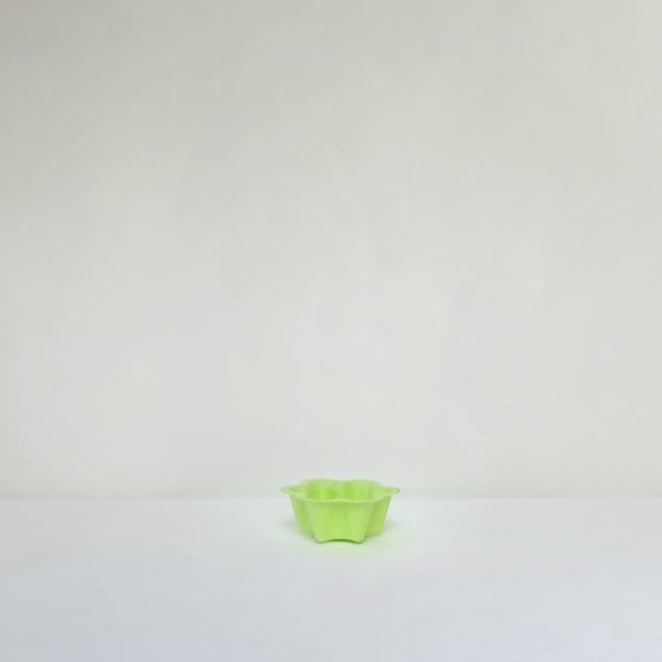 Green scalloped edged paper bowl