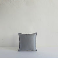 Small grey satin cushion