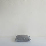 Small grey satin cushion