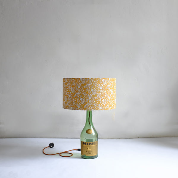 Tall bottle lamp with floral shade