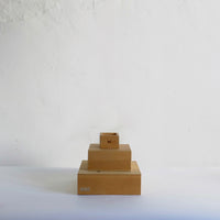 Wood box with Chinese characters.