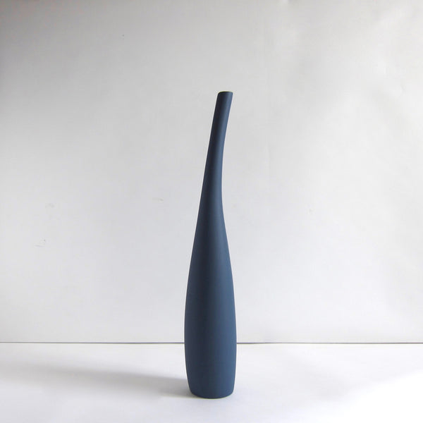 Leaning ceramic vase