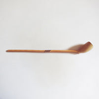 Long clay pipe