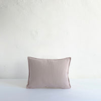 Mauve cotton cushion with oxford edging