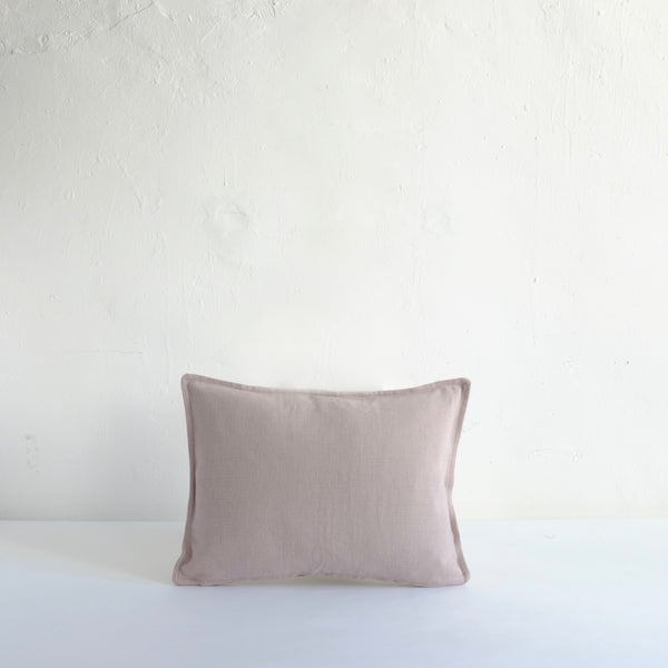 Mauve cotton cushion with oxford edging